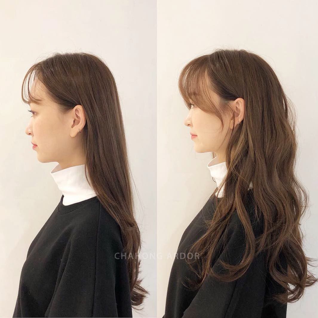 Những sợi tóc xoăn sóng lơi mang lại cho bạn vẻ đẹp phóng khoáng và sống động. Tận hưởng những đường nét mượt mà và tự nhiên trên bức hình này, sẽ khiến cho bạn yêu thích những kiểu xoăn tóc này hơn. Có thể bạn chưa biết, đó là một trong những xu hướng tóc được sao nữ Hàn Quốc yêu thích và ứng dụng nhiều nhất đó!