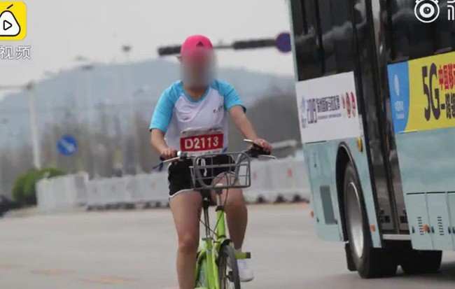Một nữ VĐV Trung Quốc bị treo giò cả đời vì đạp xe trong giải chạy marathon - Ảnh 1.