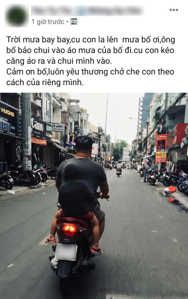 Bức ảnh gây sốt MXH trong một chiều mưa mùa Hạ: Bố luôn yêu thương và che chở cho con theo cách của riêng mình - Ảnh 1.