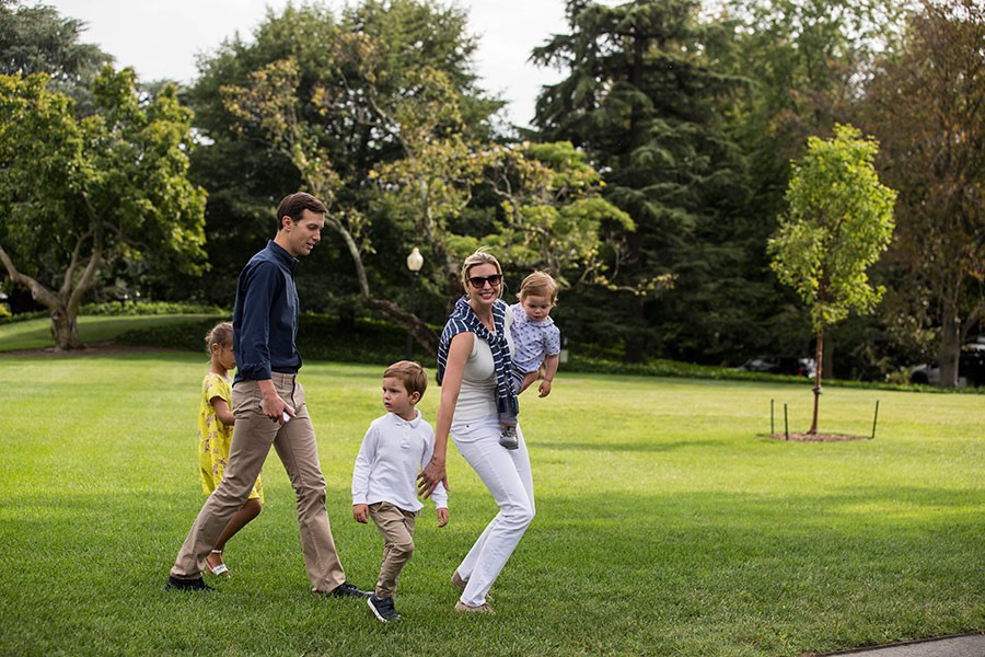 smiling-on-green-white-house-arrival-a