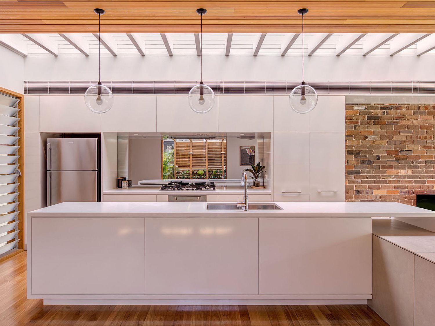 White-wood-and-brick-kitchen-of-the-contemporary-home