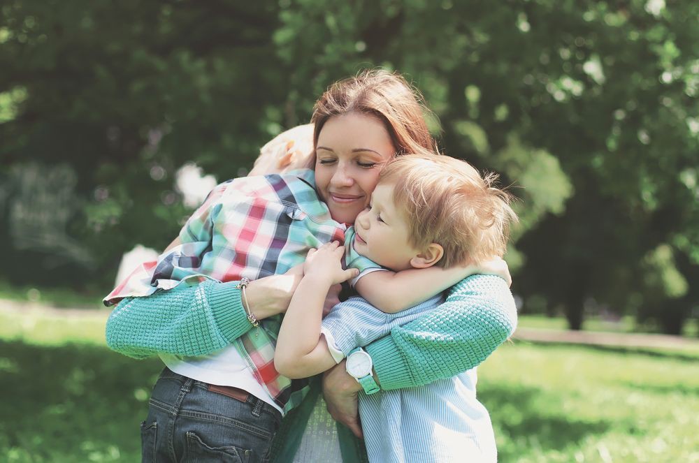 single-mom-hugging-kids_0