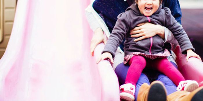 1505758959-kids-with-adults-on-slide 4