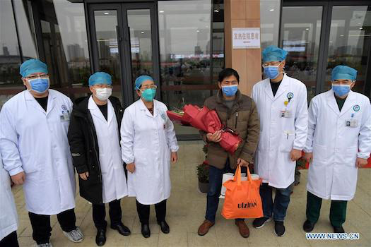 Trung Quốc: Bệnh nhân nhiễm virus corona đầu tiên xuất viện - Ảnh 1.