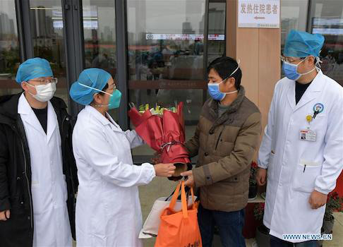 Trung Quốc: Bệnh nhân nhiễm virus corona đầu tiên xuất viện - Ảnh 4.