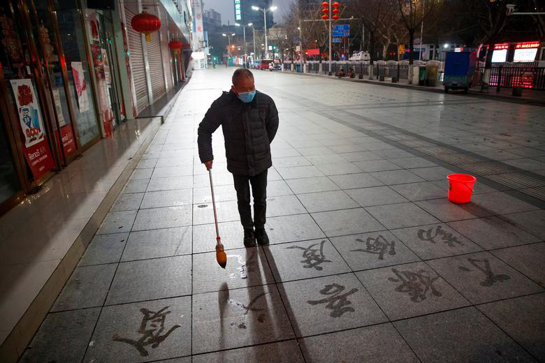 Cảnh tượng hiếm thấy: Hàng triệu người trở lại làm việc nhưng các siêu đô thị Trung Quốc vẫn chìm trong hôn mê vì dịch Covid-19 - Ảnh 10.