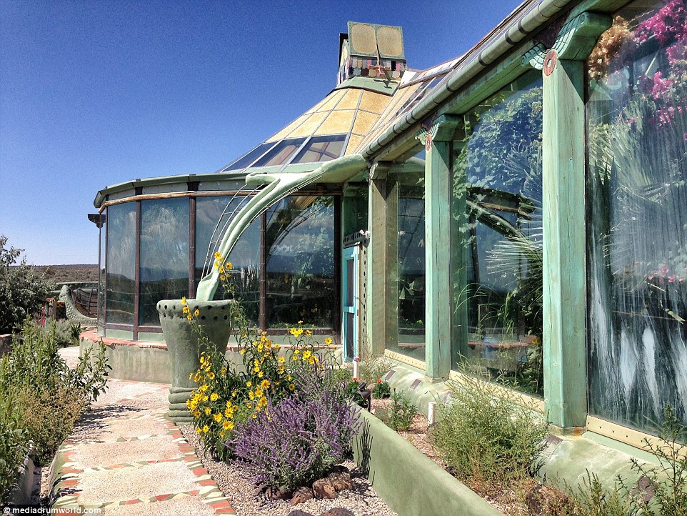 Each of the homes is designed to be self sufficient, featuring a greenhouse section, pictured right 