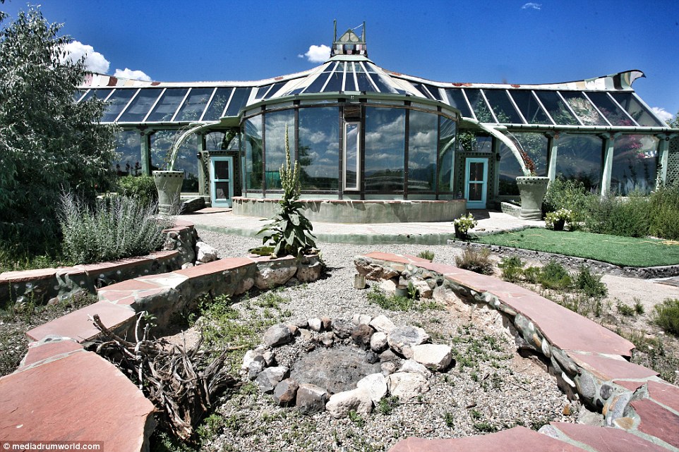 The houses are built by Earthship Biotecture, and the company believes they can help mitigate against climate change 