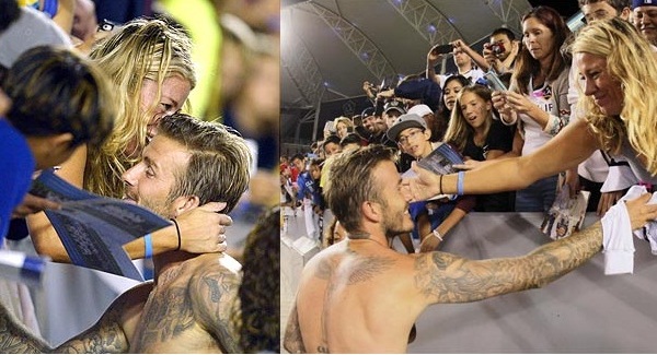 David Beckham lưng trần ôm fan nữ