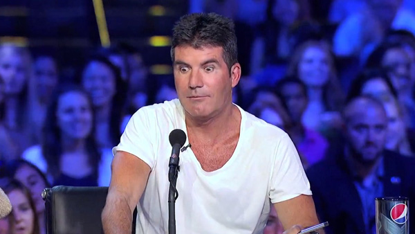 Simon Cowell ghét ra mặt ban nhạc điển trai của X Factor