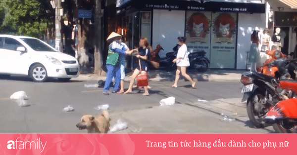 Nhắc nhở nhân viên shop thời trang vứt rác bừa bãi ra đường, nữ lao công bị cô gái trẻ đánh tới tấp