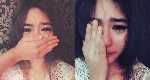 Bất ngờ với gương mặt thật của cô gái vừa che mặt vừa khóc - Ảnh 2.