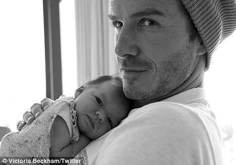 David Beckham và con gái Harper.