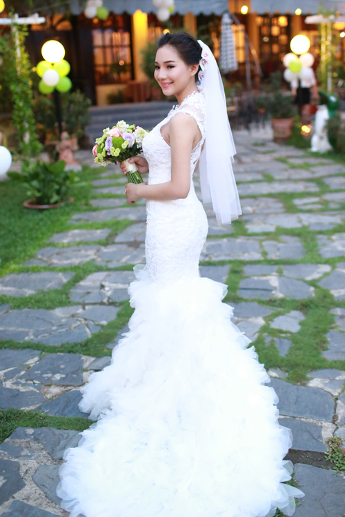Những bộ váy cưới lộng lẫy nhất showbiz Việt năm 2014 15