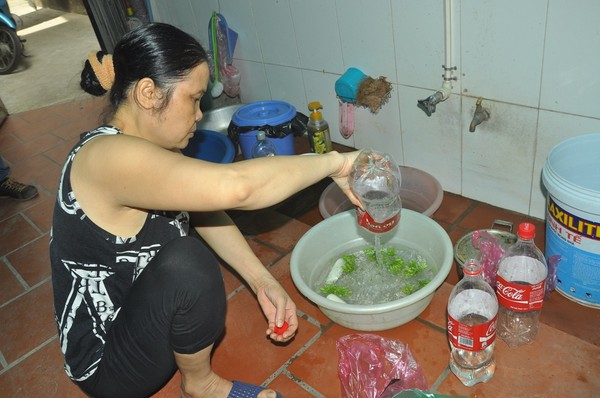 Cuộc sống hàng nghìn hộ dân Hà Nội đảo lộn vì mất nước sạch 1
