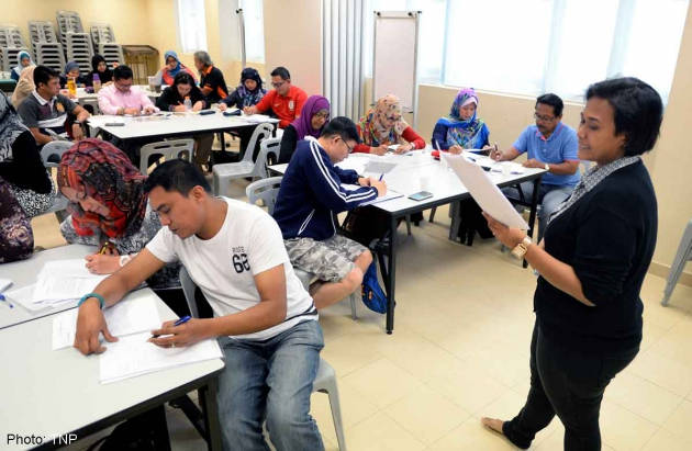 Bố mẹ Singapore đi học cách… dạy con 1