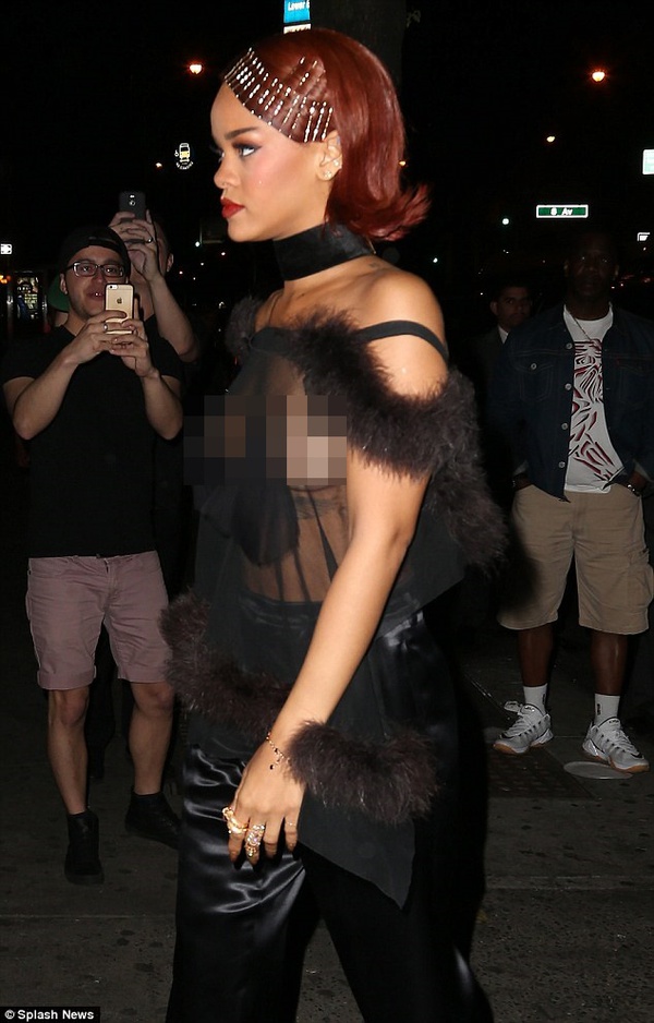 Rihanna's breasts are exposed