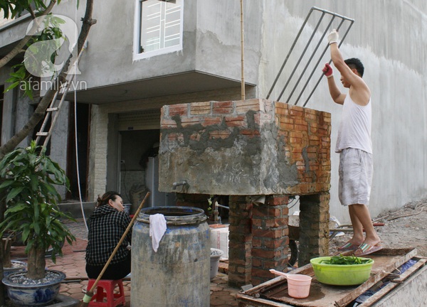 80 gia đ&igrave;nh sống bằng nước pha b&ugrave;n v&agrave;ng kh&egrave; ngay giữa H&agrave; Nội 9