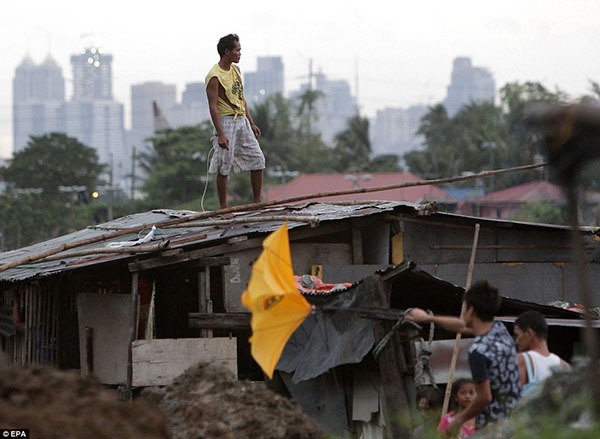 Siêu bão Haiyan hơn cả cơn sóng thần gây ra thảm cảnh tang tóc ở Philippines 5