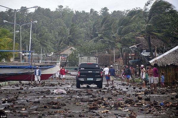 Siêu bão Haiyan hơn cả cơn sóng thần gây ra thảm cảnh tang tóc ở Philippines 7
