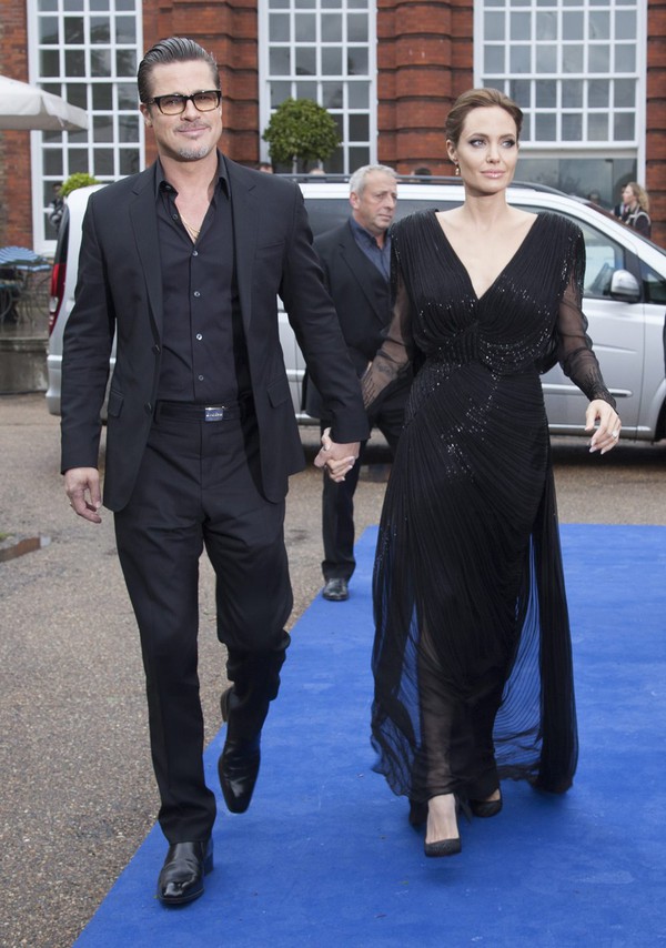 Brad Pitt tình tứ hộ tống vợ đi quảng bá phim mới 5