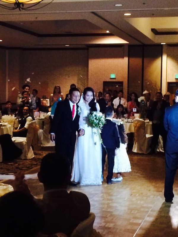Kim Hiền mặc áo dài truyền thống trong lễ cưới tại Mỹ 22