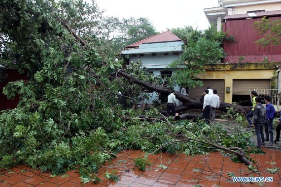 Chùm ảnh: Việt Nam sau bão Sơn Tinh lên báo nước ngoài 3