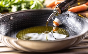 olive-oil-is-poured-from-a-bottle-into-a-modern-non-stick-frying-pan-1774426228435416441120-35-0-553-828-crop-1774426605497307728768.jpg