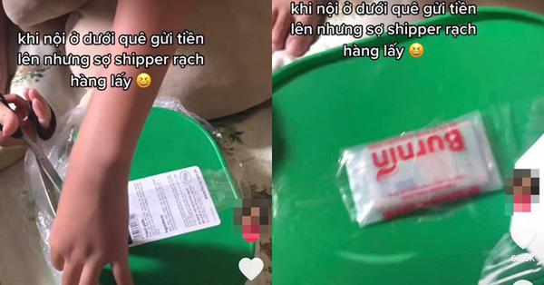 Khui hộp đồ ăn bà nội gửi dưới quê lên, cô gái sung sướng thấy cả một bọc tiền được giấu ở vị trí đặc biệt - Vimarsana News