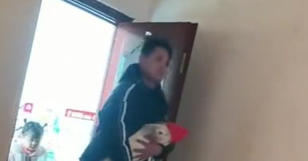 The wife is sleeping, the husband carries the child into the room and does a shocking thing