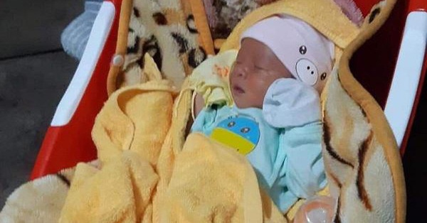 One week old baby boy abandoned on the side of the road in the dark