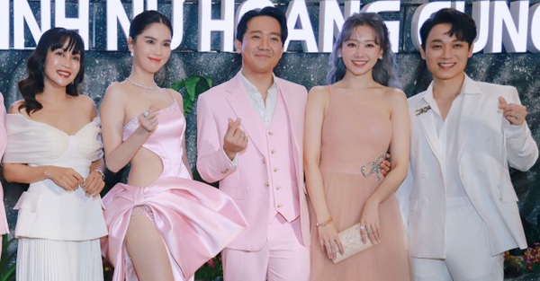 Ngoc Trinh wears a high slit dress “topped off” showing off her long legs and attractive slim waist