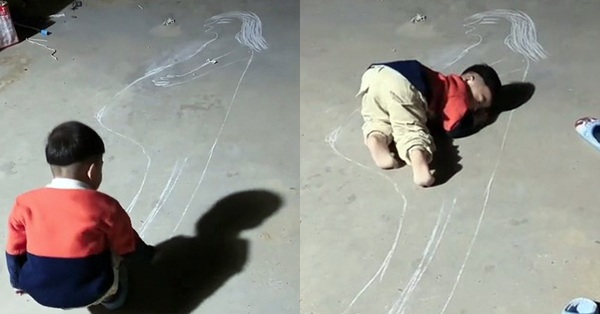 Boy doodles on the ground, action then gets emotional