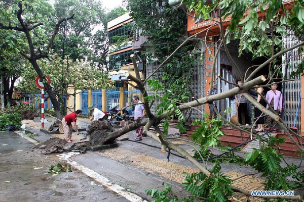 Chùm ảnh: Việt Nam sau bão Sơn Tinh lên báo nước ngoài 1