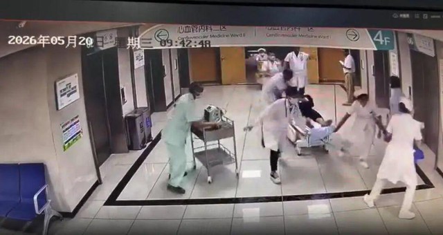 Đưa vợ đi khám bệnh, người đàn ông đột tử ngay cửa phòng khám và màn giành giật sự sống nghẹt thở trong 70 giây - Ảnh 1.