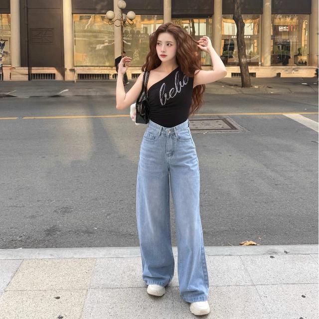 Quần jeans ống rộng là món đồ đáng đầu tư nhất mùa hè: Che chân, tôn dáng và phối gì cũng đẹp - Ảnh 12.