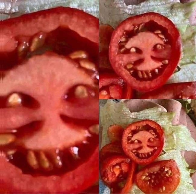 Chưa đến Halloween mà cô gái đã có một phen đứng tim với quả cà chua &quot;mặt quỷ&quot; khi đang mải mê vào bếp nấu ăn - Ảnh 1.