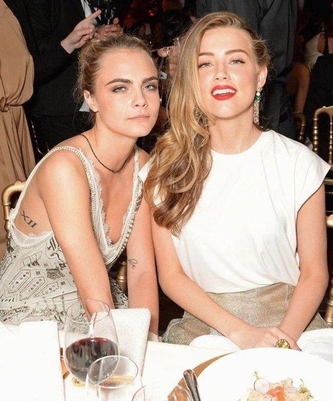 Amber Heard và Cara Delevingne