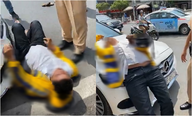 Clip: Tài xế xe ôm công nghệ say rượu nằm lăn quay trước đầu xe Mercedes ăn vạ và màn gọi tên đặc biệt khi thấy CSGT khiến ai cũng không nhịn được cười - Ảnh 1. Clip: Tài xế xe ôm công nghệ say rượu nằm lăn quay trước đầu xe Mercedes ăn vạ và màn gọi tên đặc biệt khi thấy CSGT khiến ai cũng không nhịn được cười - Ảnh 1.