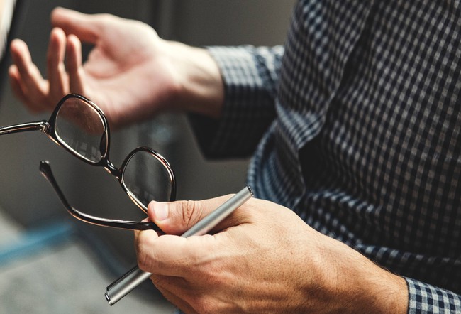 man-with-glasses-at-workplace-1598637675135640541894.jpg