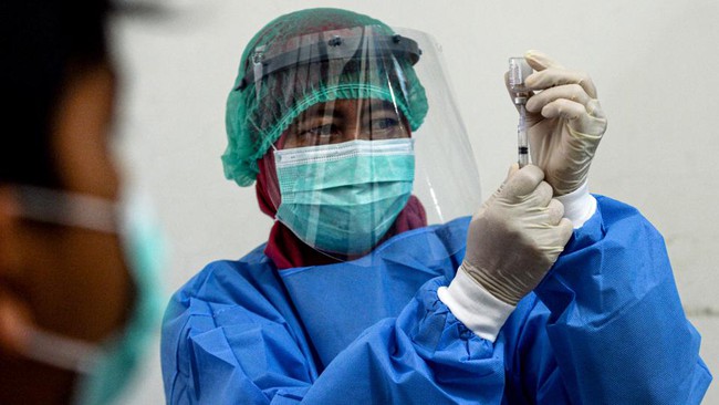 Tại sao nước Anh cho phép tình nguyện viên phơi nhiễm virus SARS-CoV-2? - Ảnh 3. Tại sao nước Anh cho phép tình nguyện viên phơi nhiễm virus SARS-CoV-2? - Ảnh 3.
