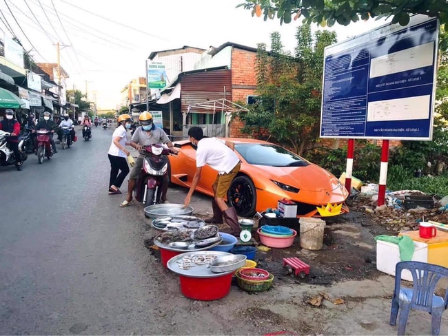 Đại gia Việt &quot;kín tiếng&quot; lái siêu xe Huracan 16 tỷ xuống đường để... bán cá?  - Ảnh 1.