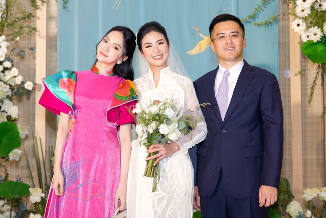 Dàn khách mời tại hôn lễ của Hoa hậu Ngọc Hân: Các Hoa - Á hậu diện áo dài thanh lịch và duyên dáng - Ảnh 6.