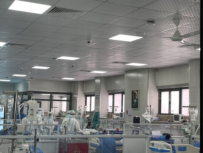 DIỄN BIẾN DỊCH NGÀY 18/02: Bệnh viện điều trị Covid-19 ở Hà Nội kín giường - Ảnh 1.