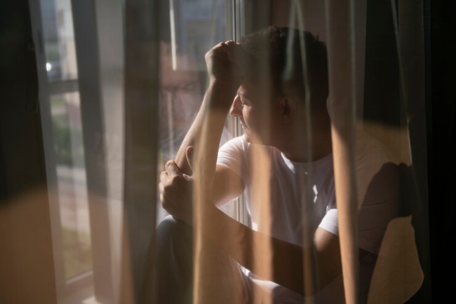 creative-portrait-man-with-curtains-shadows-from-window23-2149657489-1744975163217987980665.jpg