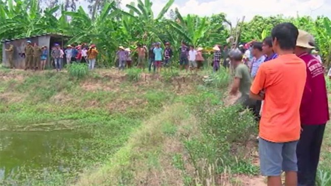 Bắt nghi can sát hại bé gái 9 tuổi rồi giấu xác dưới ao - Ảnh 1. Bắt nghi can sát hại bé gái 9 tuổi rồi giấu xác dưới ao - Ảnh 1.