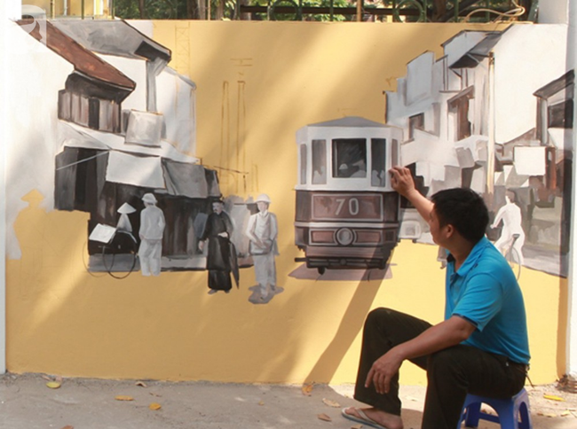 Hà Nội: Nhiều người ngỡ ngàng trước bức tường cũ kỹ trên phố Phan Đình Phùng được khoác áo mới - Ảnh 4.