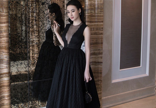 Diện váy đen cuốn hút, Angela Phương Trinh khoe trọn vóc dáng gợi cảm hút mắt - Ảnh 1.