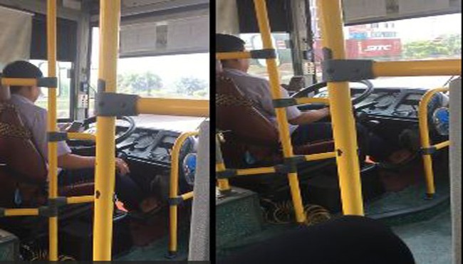 Vừa lái xe vừa dùng điện thoại, tài xế xe buýt ở Hà Nội bị đình chỉ công việc - Ảnh 1.