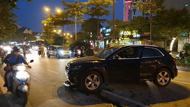 Hà Nội: Danh tính tài xế siêu xe Audi Q5 đâm và lùi liên hoàn, làm gãy chân một người rồi bỏ trốn - Ảnh 6.